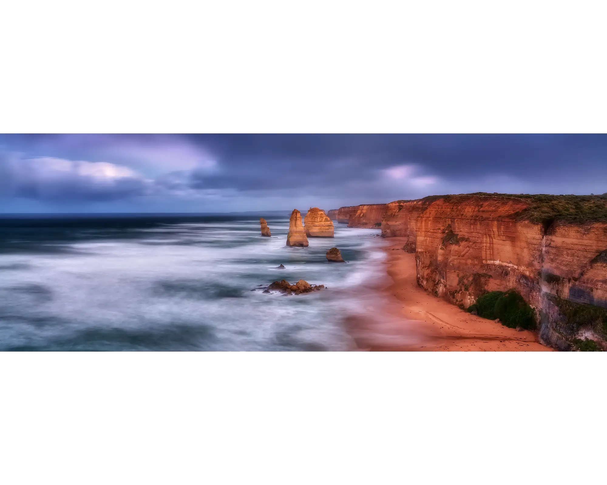 Dramatic stormy skies over the Twelve Apostles, Port Campbell National Park, Victoria. 