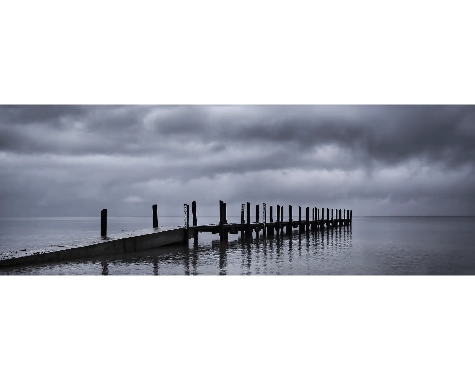 Storm clouds over Quindalup Jetty, Geographe Bay, WA. 