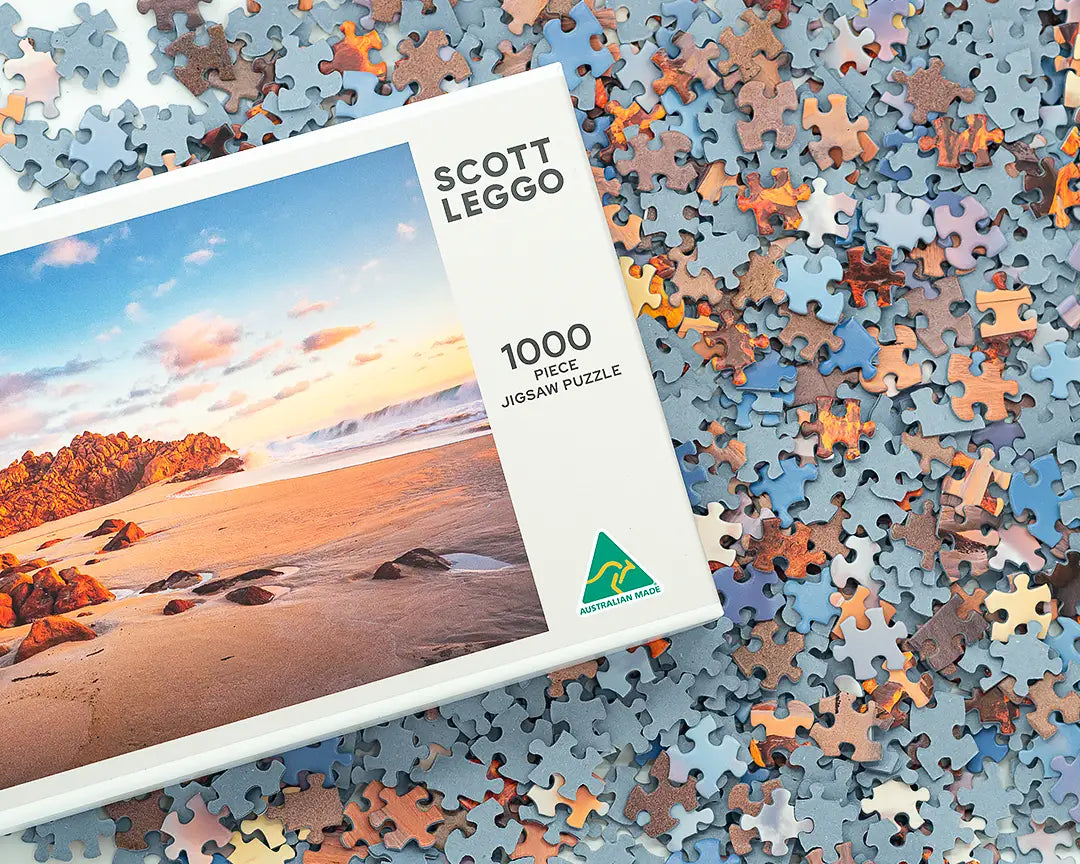 jigsaw puzzle on top of puzzle pieces.