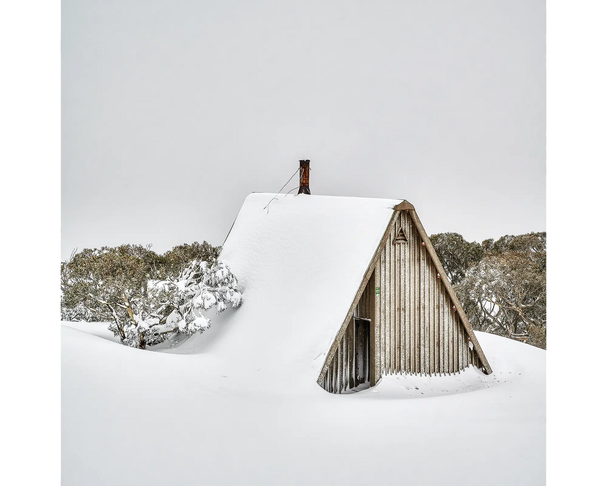 Diamantina Hut covered in snow on Mount Hotham.