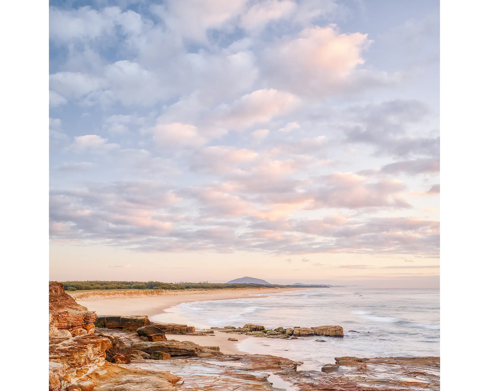 Shoreline sunrise at Mudjimba Beach, Sunshine Coast, Queensland.