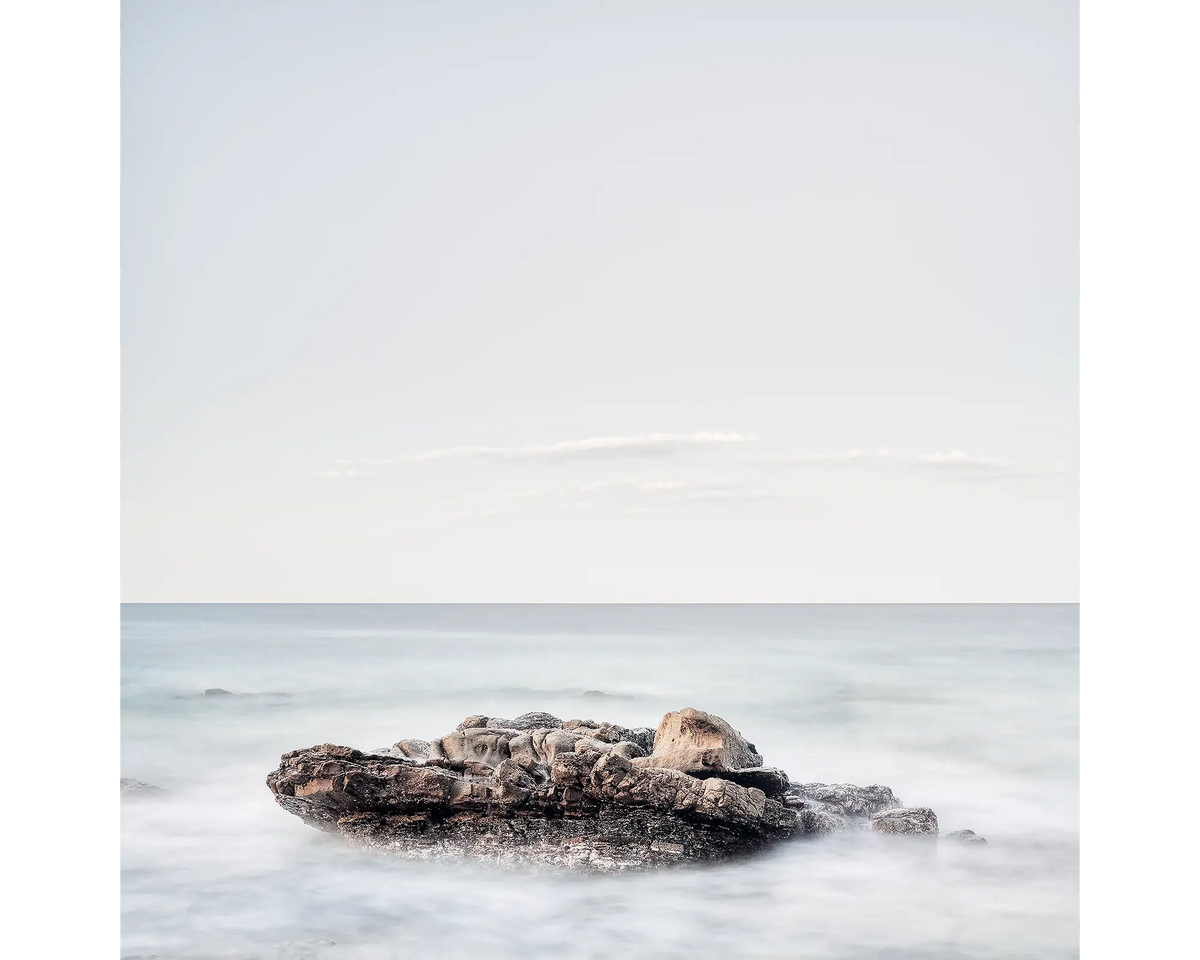 Rock in water at Point Arkwright, Sunshine Coast, Queensland, Australia.