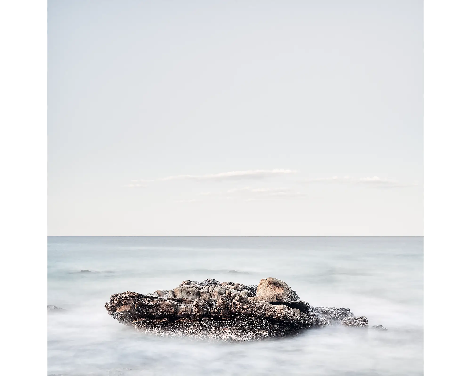 Rock in water at Point Arkwright, Sunshine Coast, Queensland, Australia.