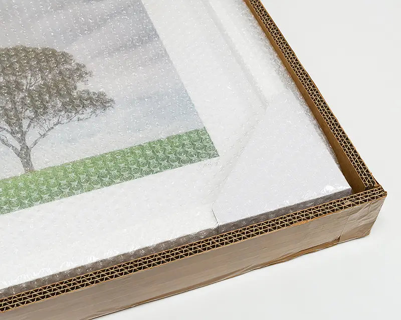 Wall art print in packaging box.