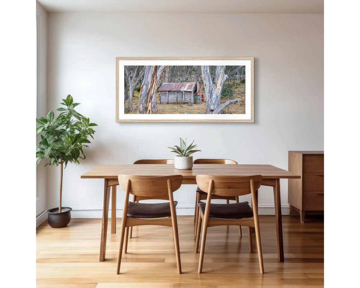 Abode Among the Gum Trees. Cascade Hut, Kosciuszko National Park photographic artwork with a timber frame, hung in a kitchen. 