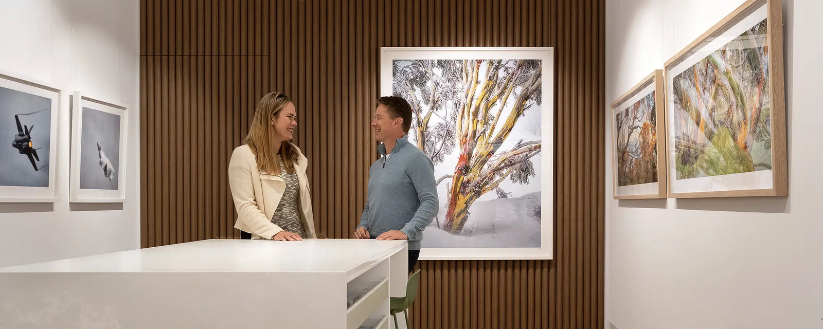 Staff inside the Scott Leggo Gallery.