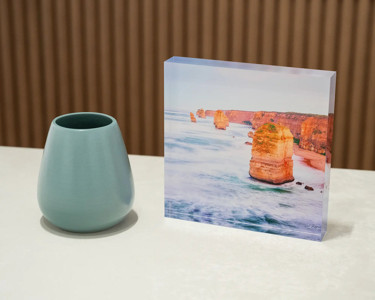 Against The Tide. Acrylic block Twelve Apostles, Great Ocean Road, Victoria, styled with a small vase.