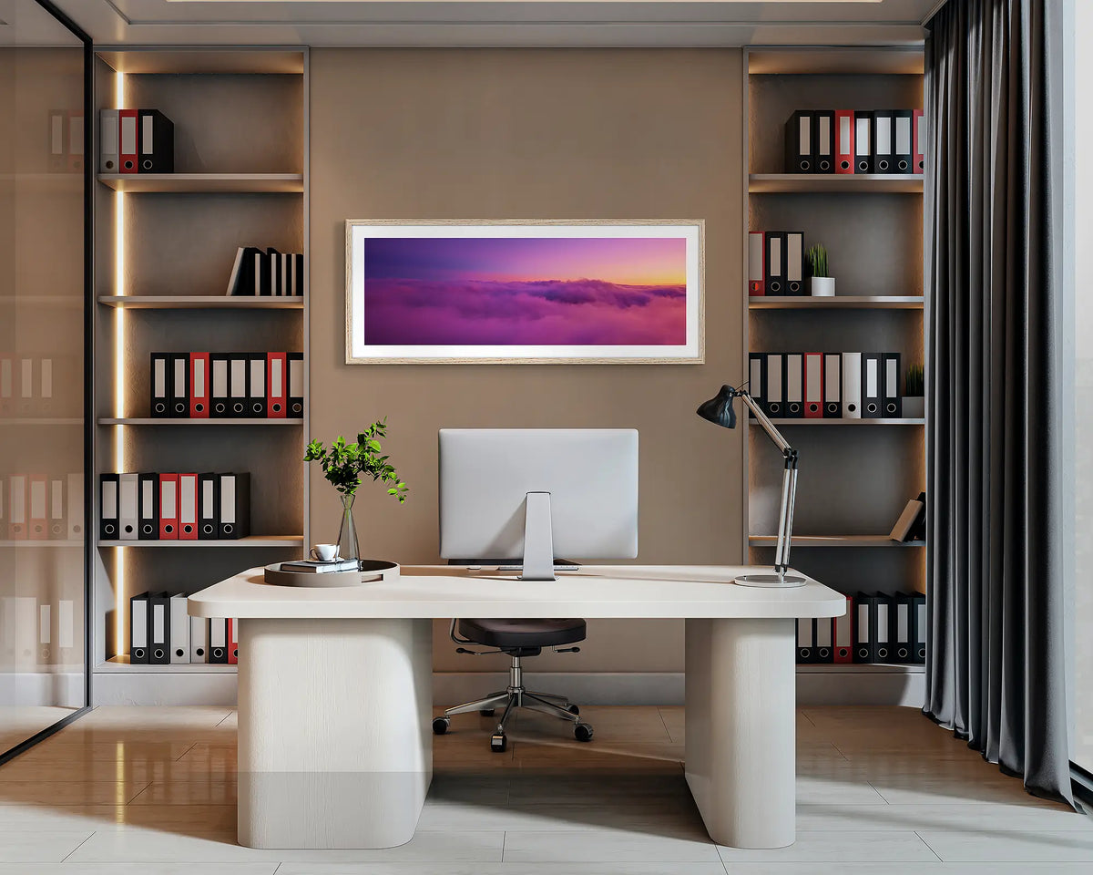 Alone. Alpine sunset wall art with a Tasmanian Oak frame hung behind an office desk. 
