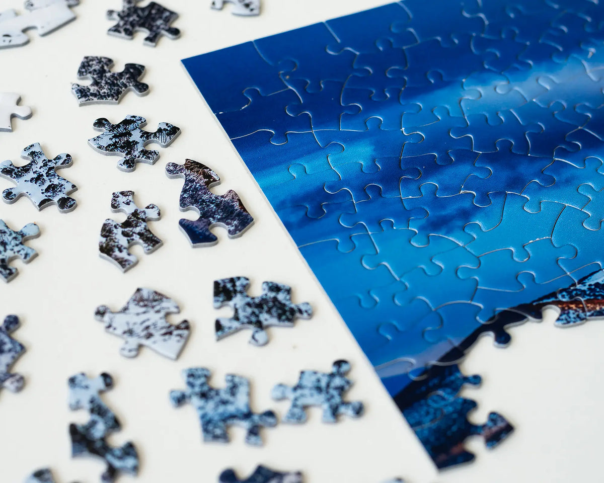 Alpine Magic 1000 piece jigsaw puzzle being made with sky section complete.