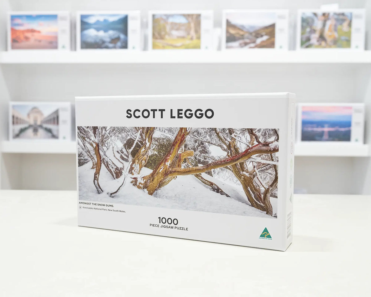 Amongst The Snow Gums. 1000 piece jigsaw puzzle sitting on a desk in the gallery.
