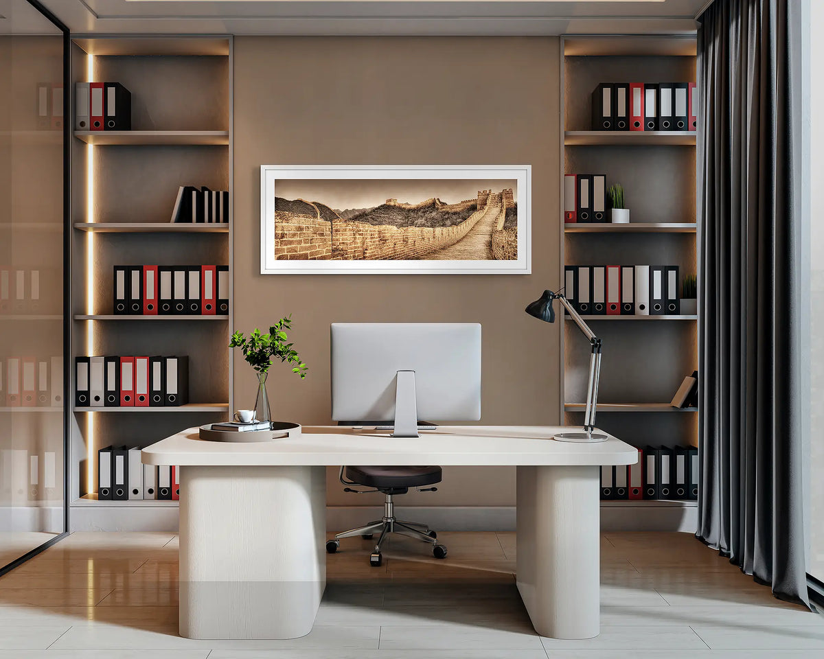 Ancient Wall. Great Wall of China, wall art print with a white frame, hung behind an office desk. 