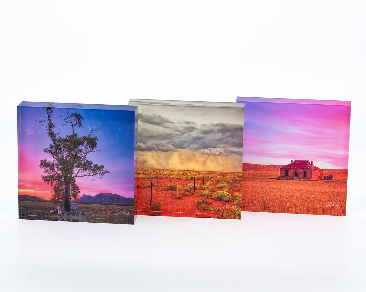 Approaching Storm acrylic block sitting on desk with other Outback acrylic block artworks.