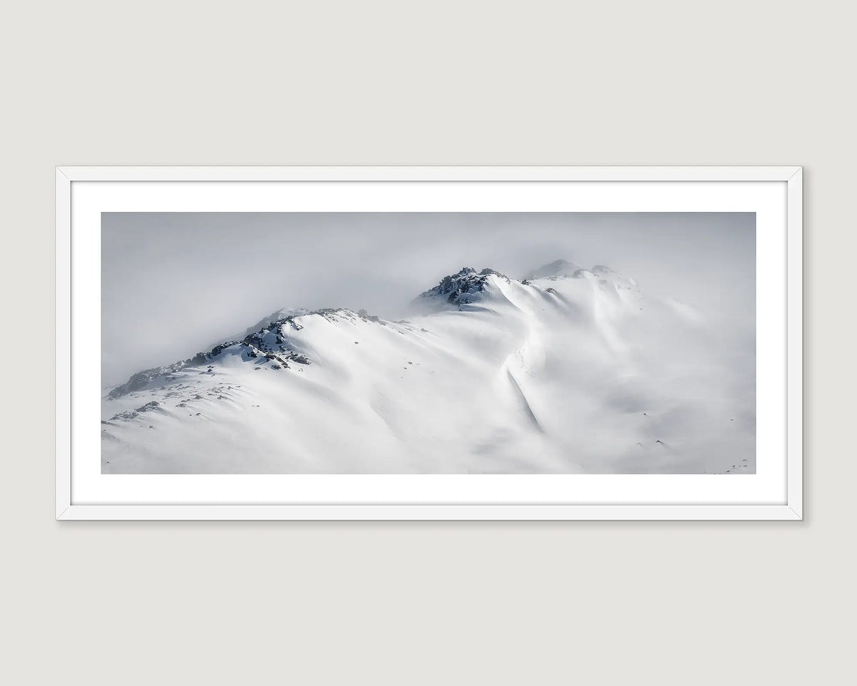Framed wall art print of morning fog rolling over the snowy ranges of Kosciuszko National Park.