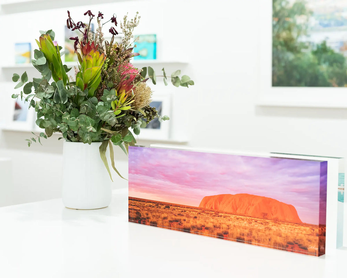 Australian Icon acrylic block - Uluru artwork sitting on table in Scott Leggo Gallery.