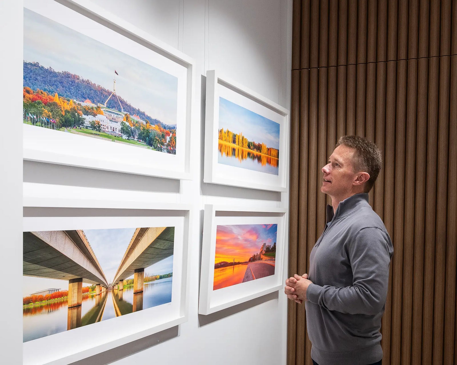 Framed wall art print of both old and new Parliament House on an autumn evening. 