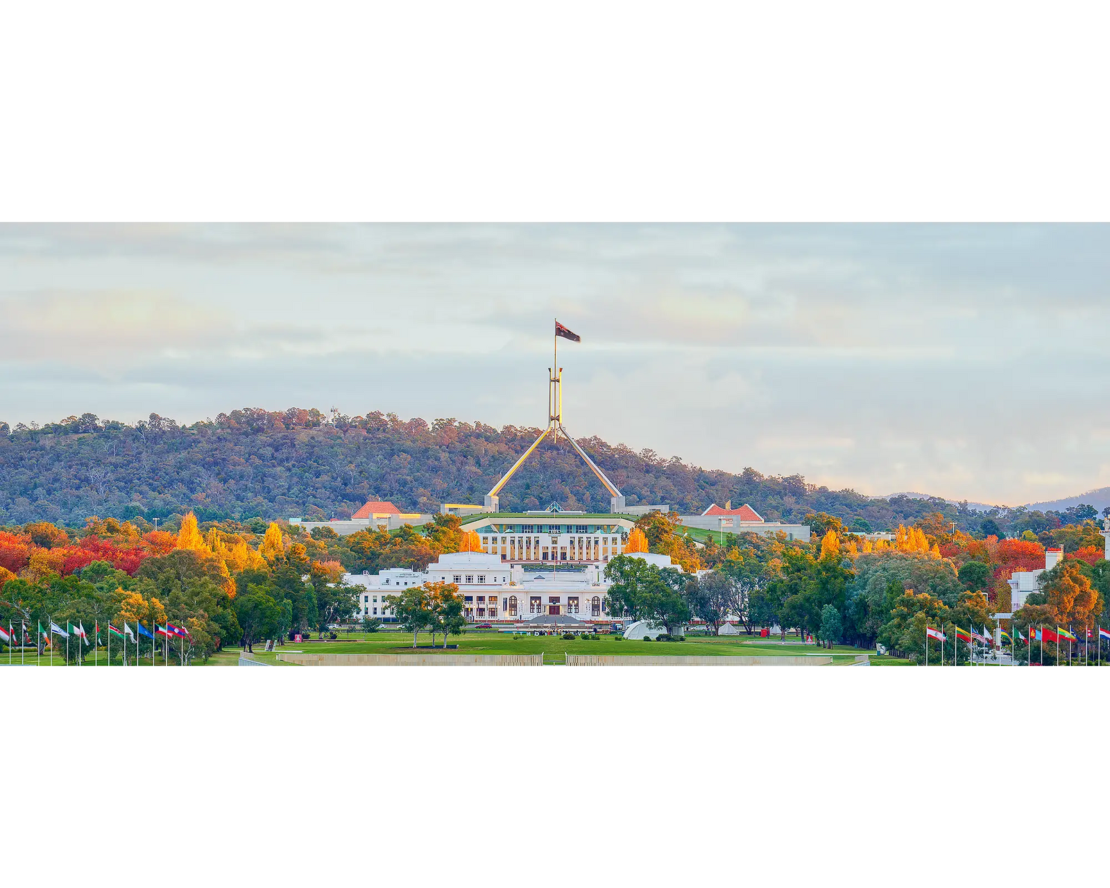 Autumn Bubble. Colourful autumn trees in front of old and new Parliament House, Canberra.