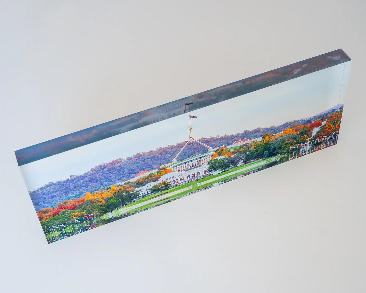 Autumn Bubble. Top view of Acrylic block of autumn trees surrounding Old and New Parliament House.