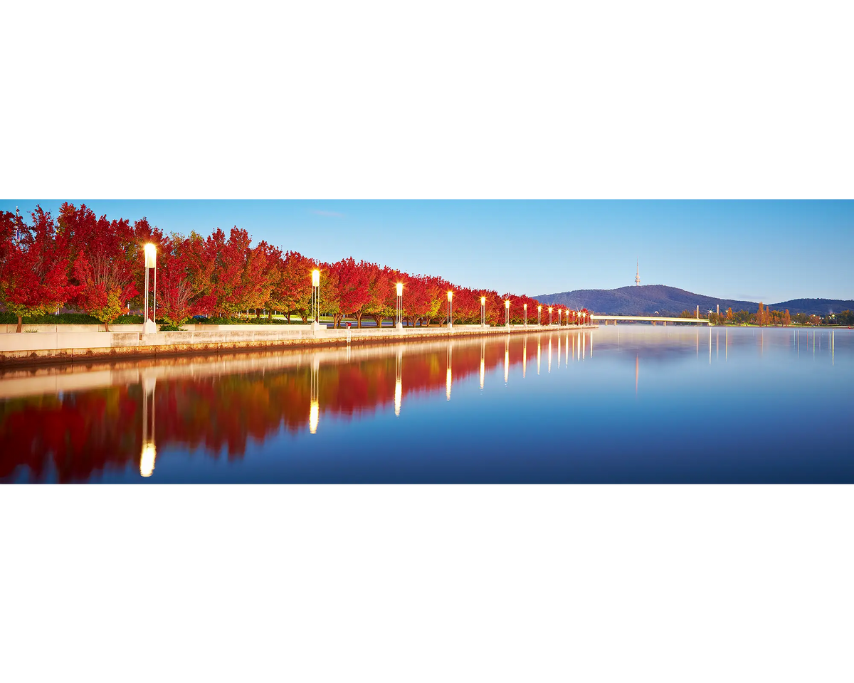 Autumn Sunrise with red autumn trees beside Lake BUrley Griffin, Canberra.