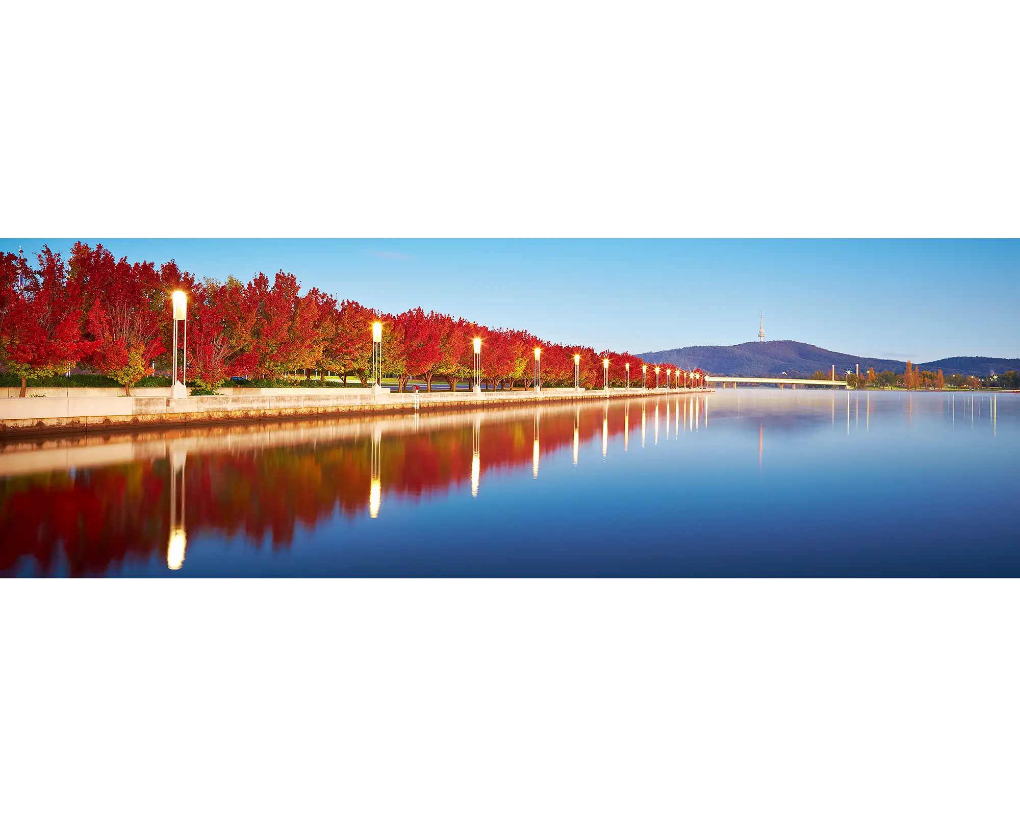 Autumn Sunrise with red autumn trees beside Lake BUrley Griffin, Canberra.