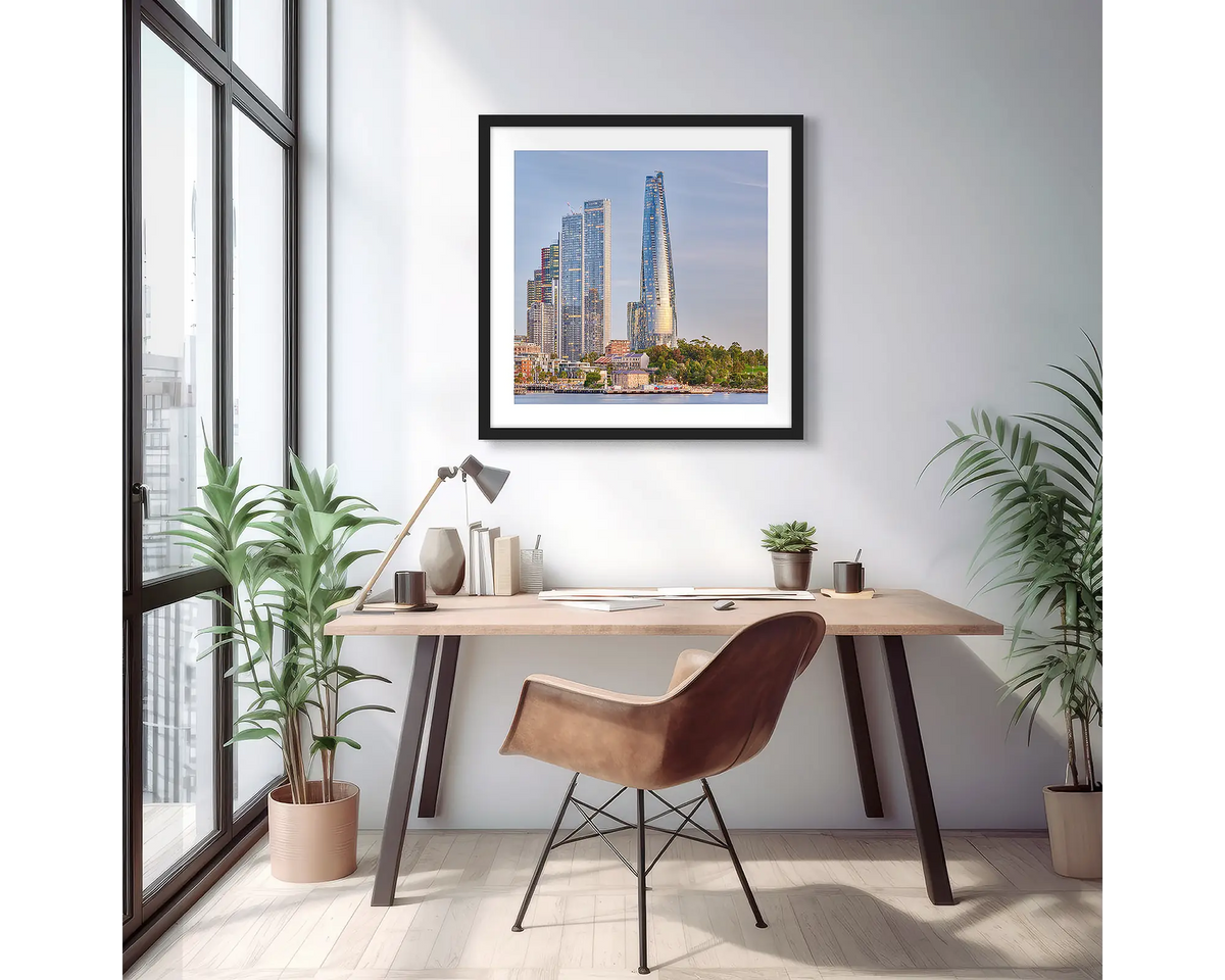 Barangaroo Pillars. Sydney wall art print of Crown Towers, framed in a black frame on an apartment wall. 