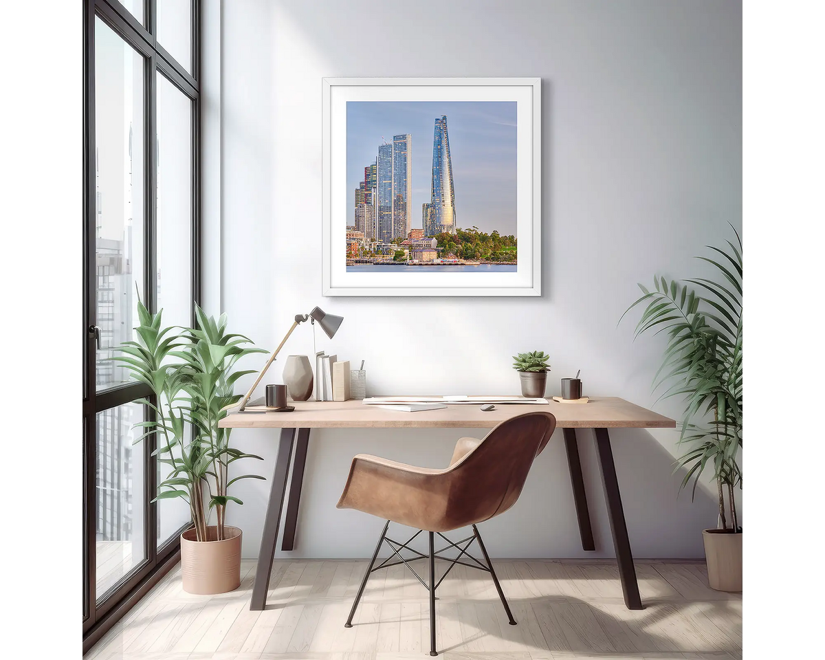 Barangaroo Pillars. Sydney wall art print of Crown Towers, framed in a white frame on an apartment wall. 