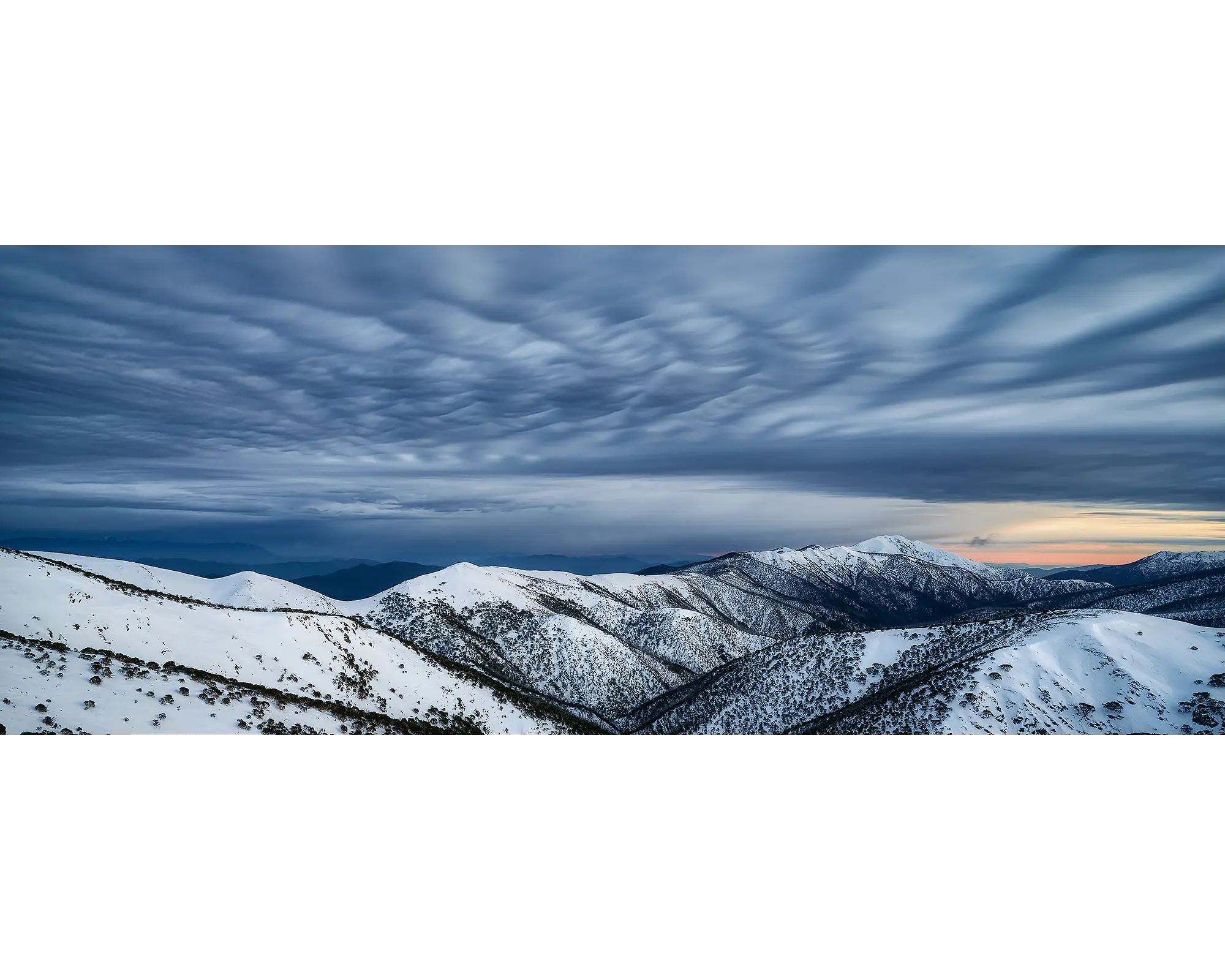 Before The Storm. Clouds over snow covered Razorback and Mount Feathertop summit.
