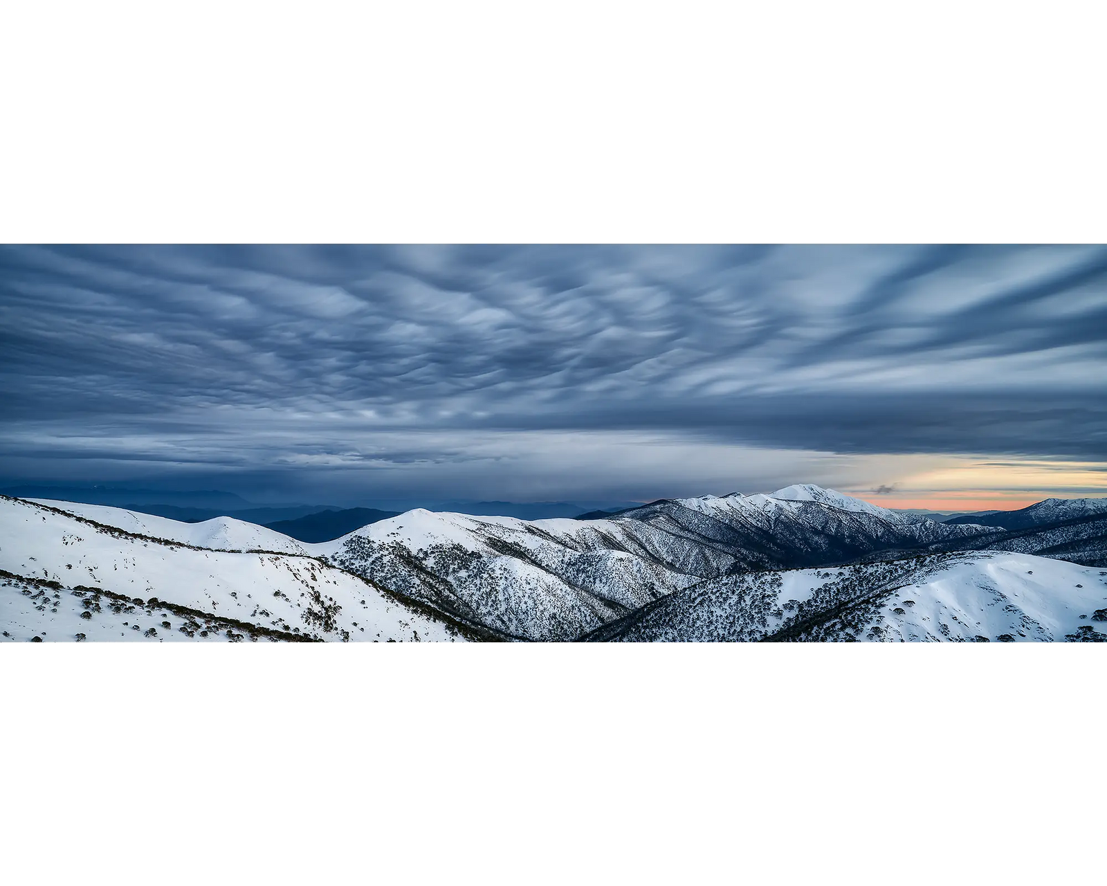 Before The Storm. Clouds over the razorback and Mount Feathertop Summit.