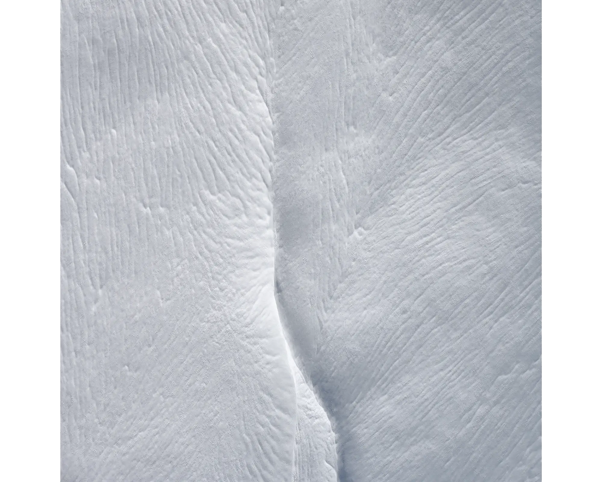 Beginning. Aerial view of Swampy Plains River covered in snow, Kosciuszko National Park.