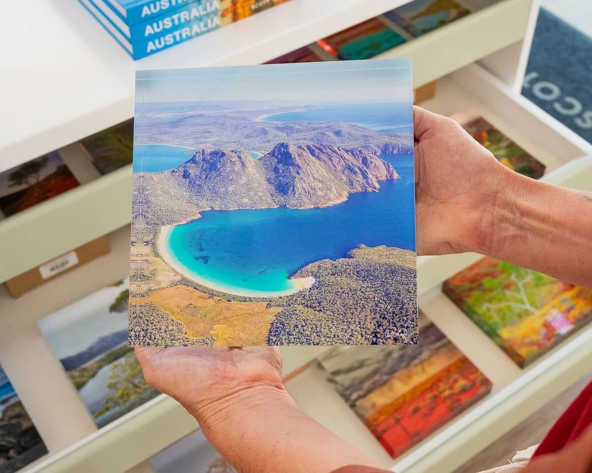 Blue Beauty. Acrylic block aerial view of Wineglass Bay Tasmania, being hand held.