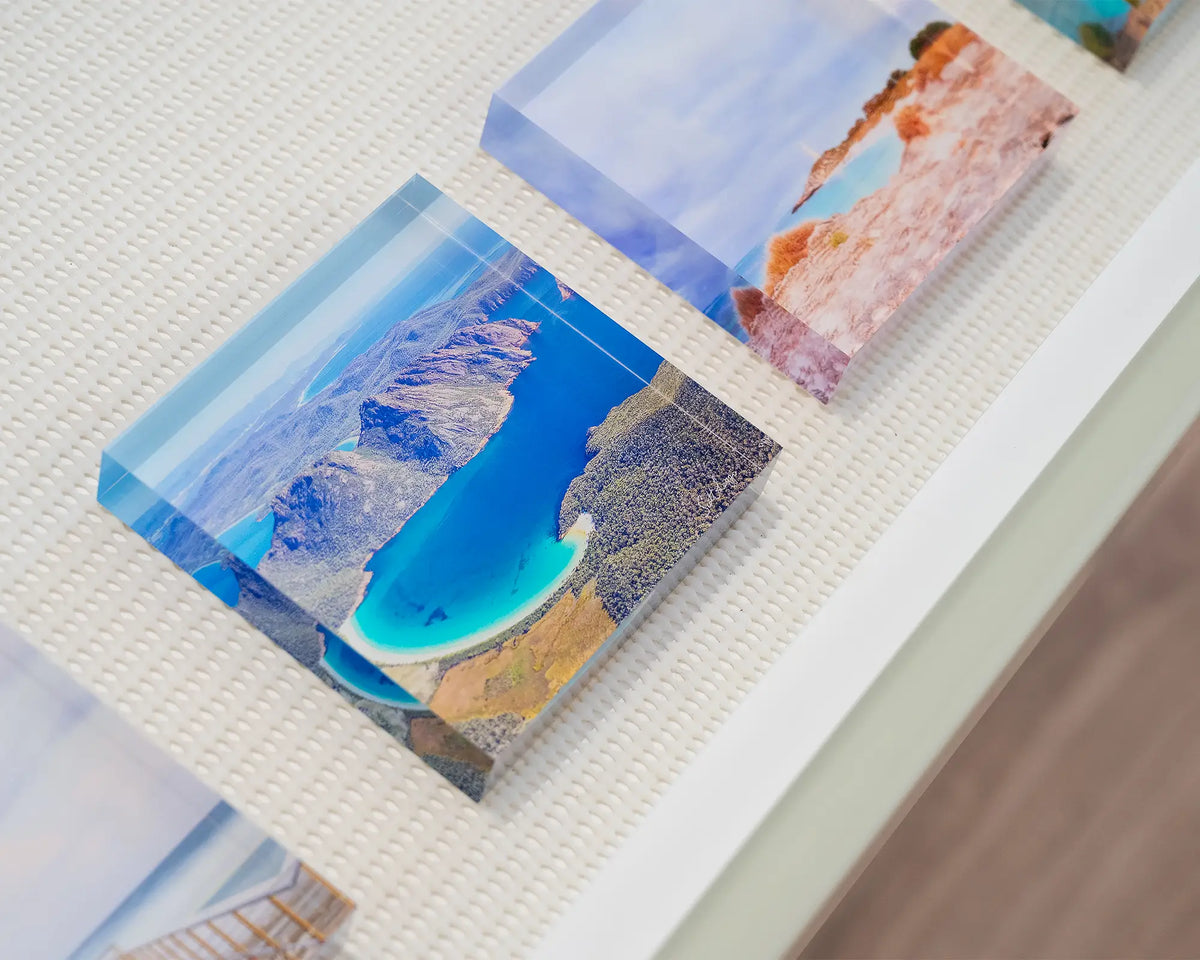 Blue Beauty. Acrylic block aerial view of Wineglass Bay, Tasmania, displayed in gallery drawer.