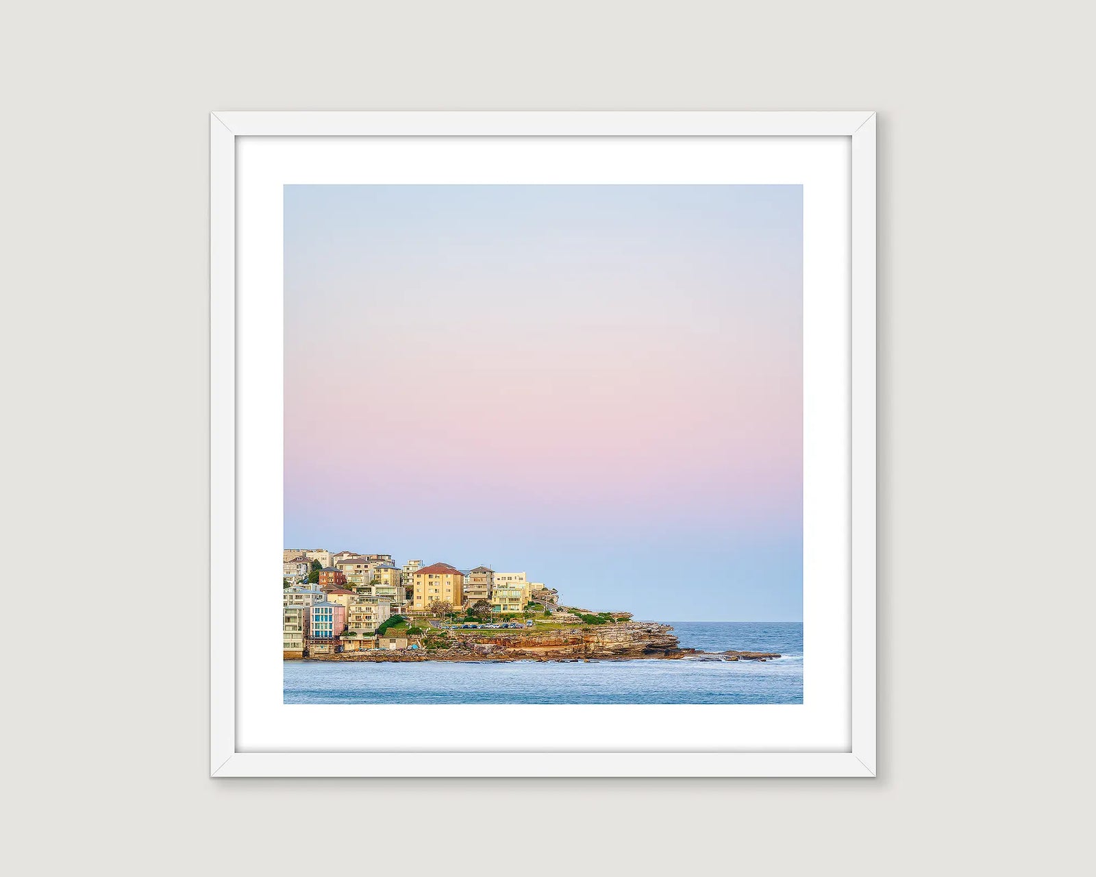 Framed artwork of a coastal sunset at Bondi, Sydney. 