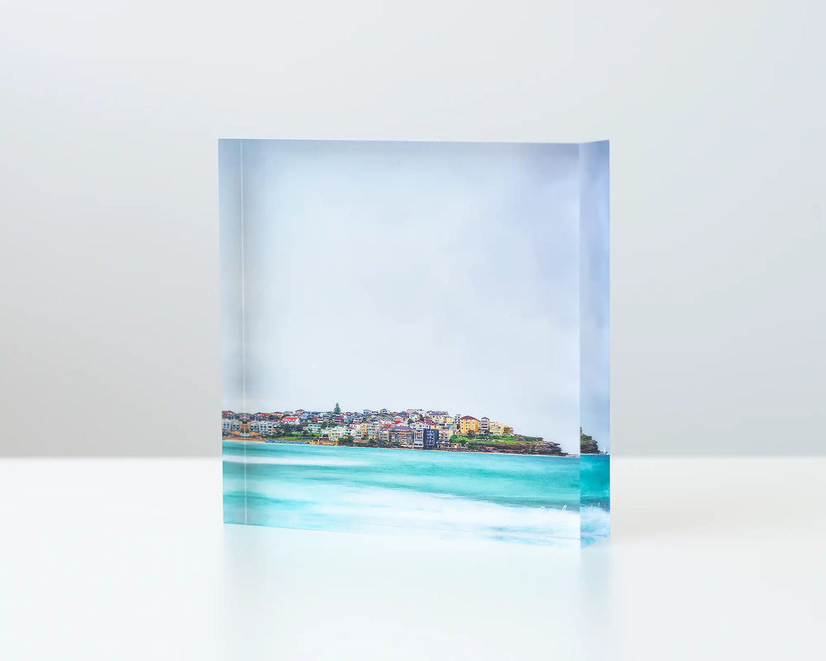 Bondi Views - Acrylic block - Sydney coastal artwork sitting on desk.