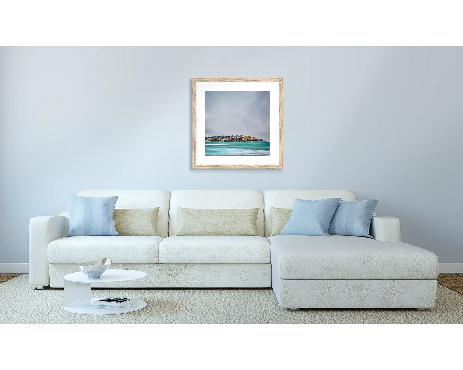 Framed artwork of a coastal scene of Bondi with a stormy sunrise. 