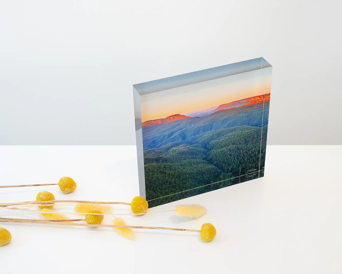 Breaking Dawn. Acrylic block sunrise over Blue Mountains National Park, styled with dried flowers.