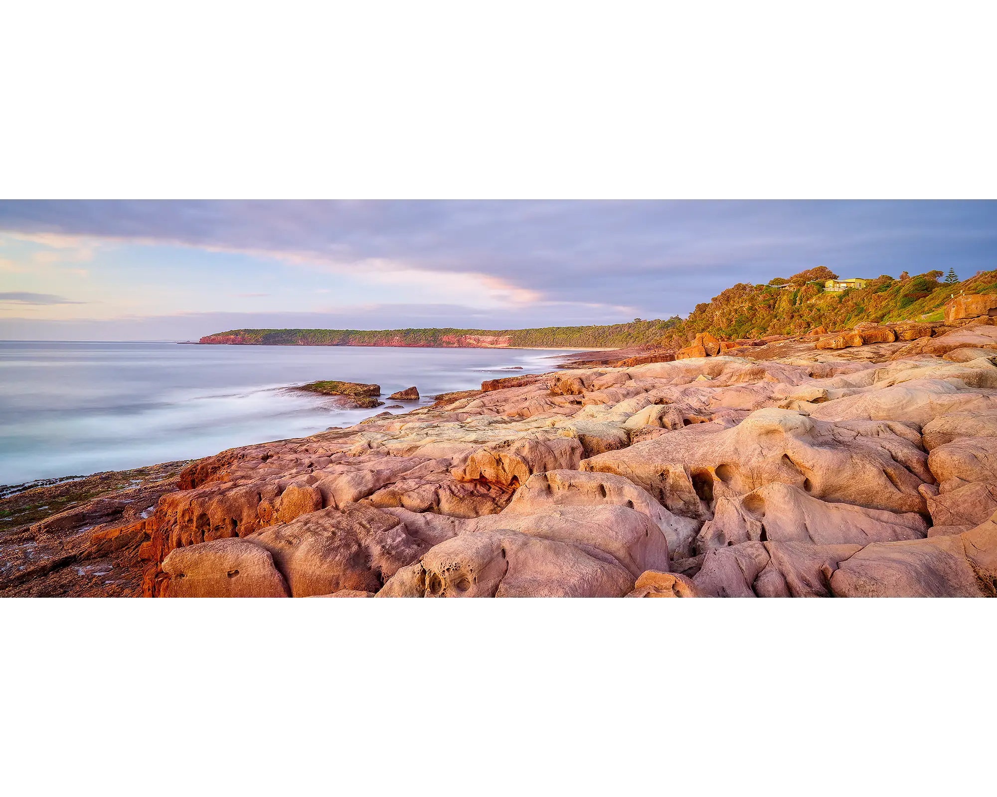 Breaking Through - Sunrise at Short Point, Merimbula, New South Wales.