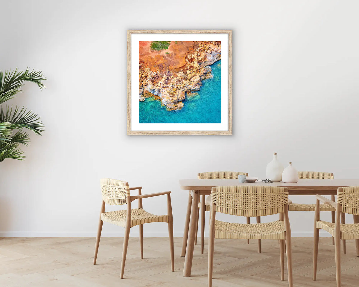Broome Contrasts. Photographic wall art print of Gantheaume Point, Broome, with a timber frame hung in a dining room. 