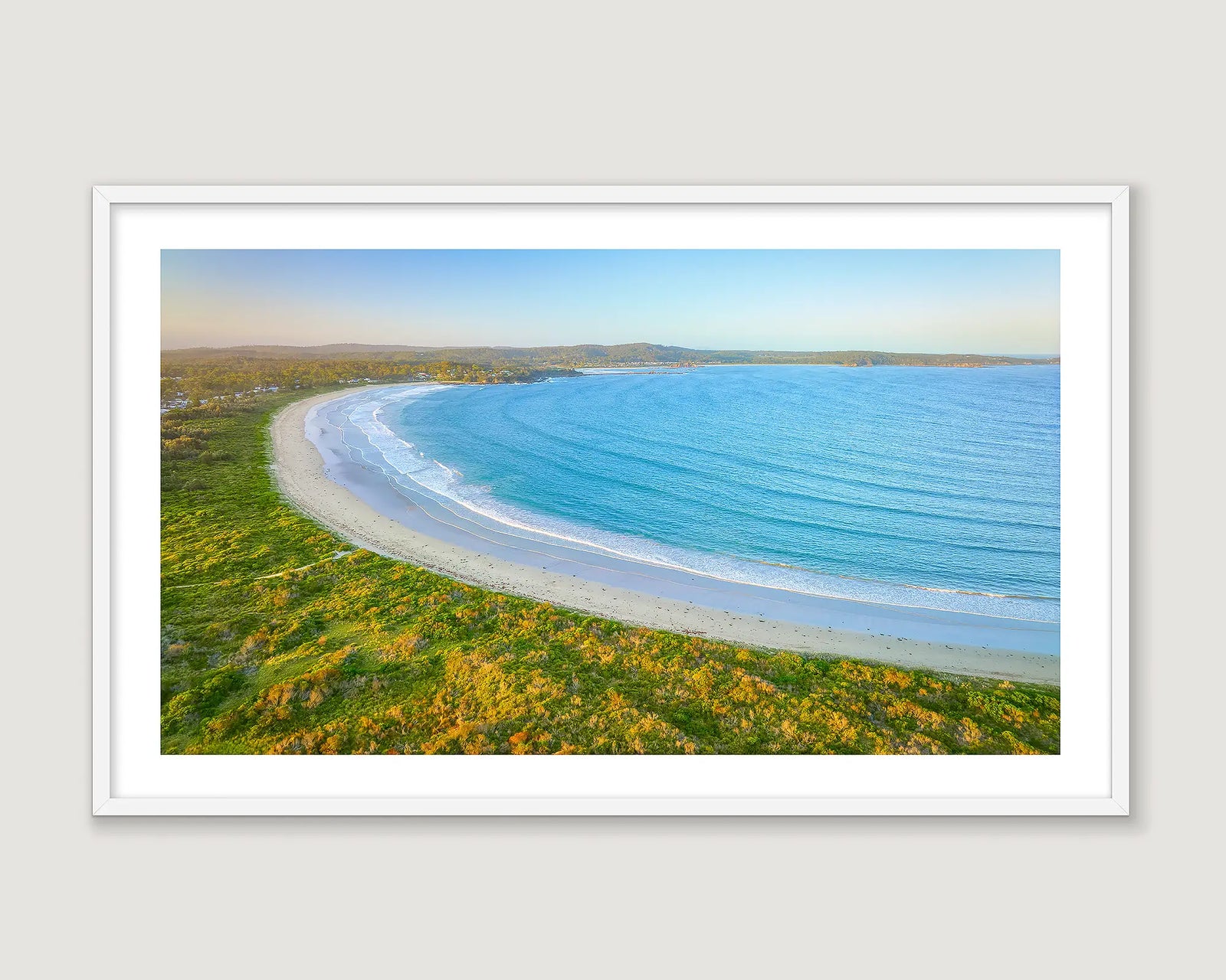 Framed wall art print of a coastal scene of a sunset at Broulee Beach. 