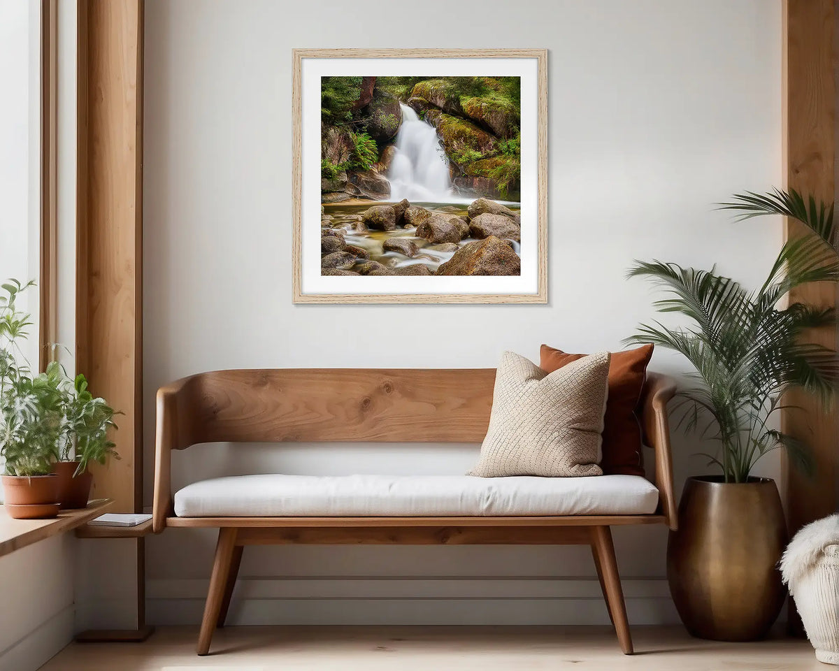 Buffalo Flow. Timber framed wall art print of Ladies Bath Falls, hung in a scandi-themed waiting area. 