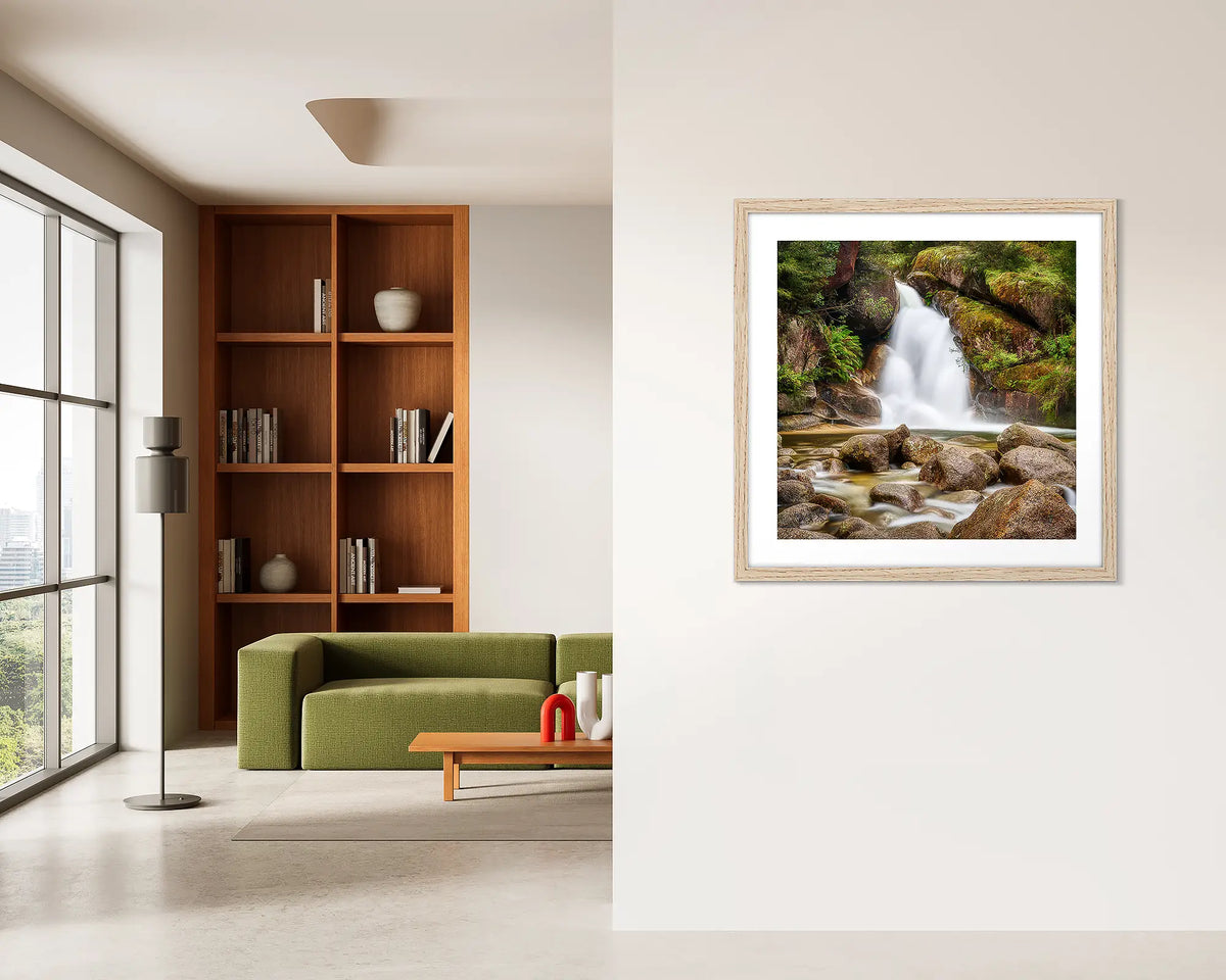 Buffalo Flow. Waterfall wall art print with a timber frame, hung on an apartment wall. 