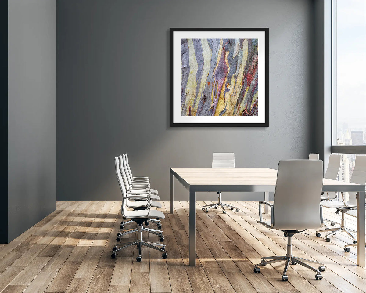 Buller Bark. Abstract wall art print of snow gum bark on Mount Buller, framed with a black frame, hung in a corporate boardroom. 