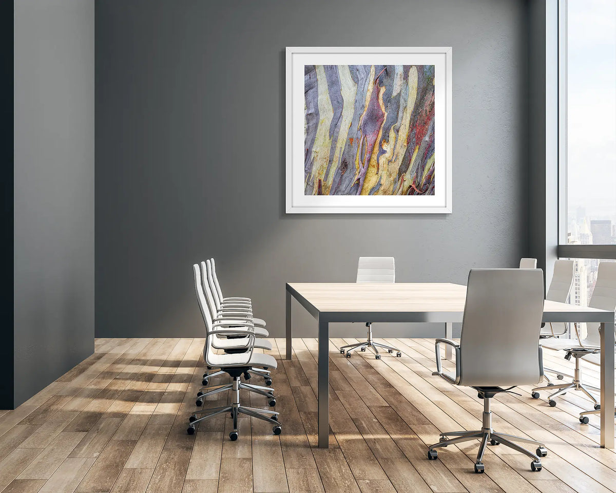 Buller Bark. Abstract wall art print of snow gum bark on Mount Buller, framed with a white frame, hung in a corporate boardroom. 
