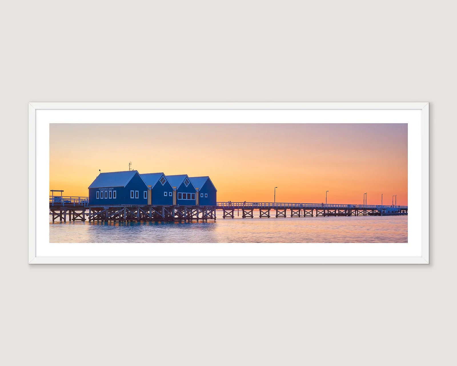 Framed artwork of Busselton Jetty at sunset.
