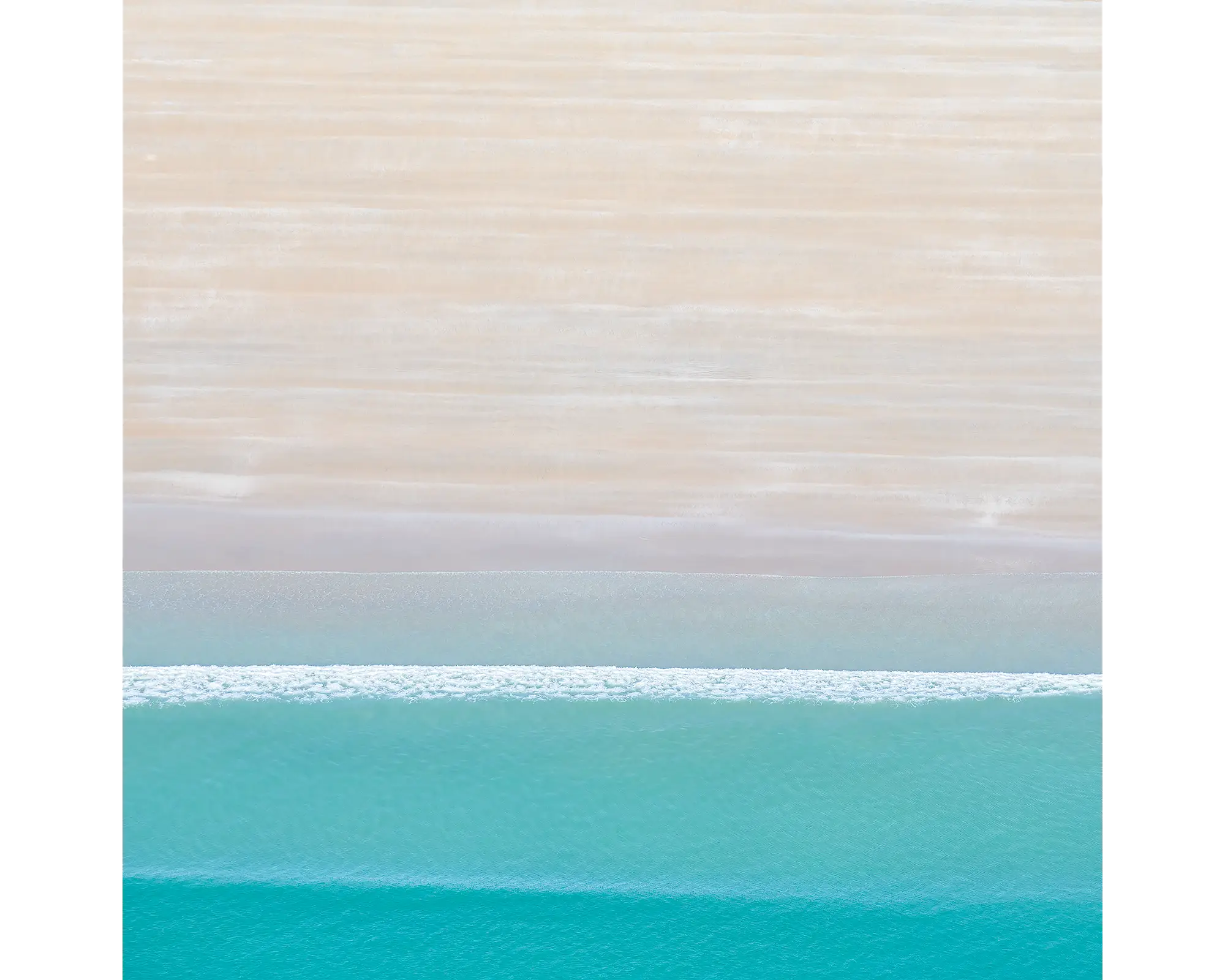 Aerial view of water and sand, Cable Beach, Broome, Western Australia.