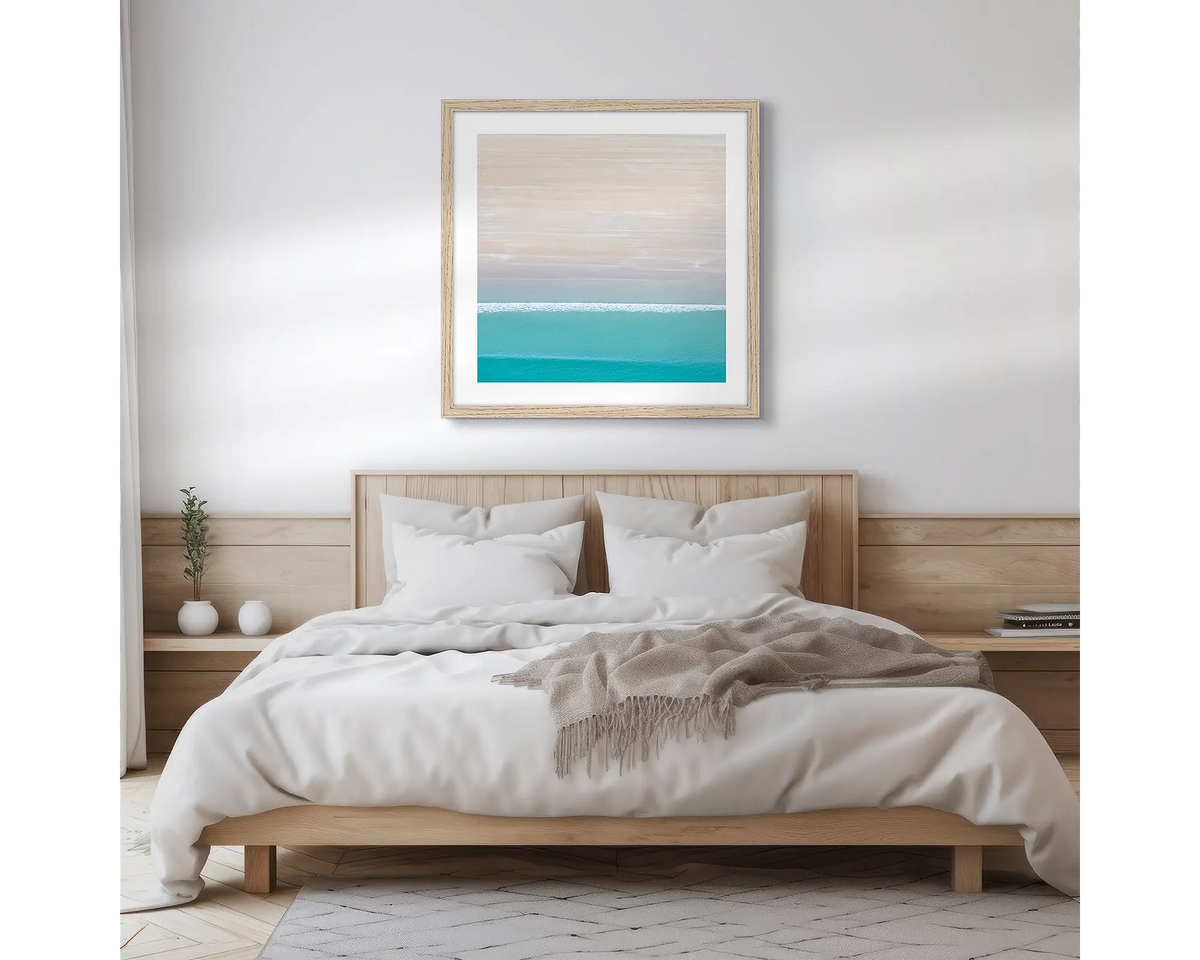 Cable Calm. Broome coastal photographic wall art print, with a timber frame, hung in a scandi bedroom. 