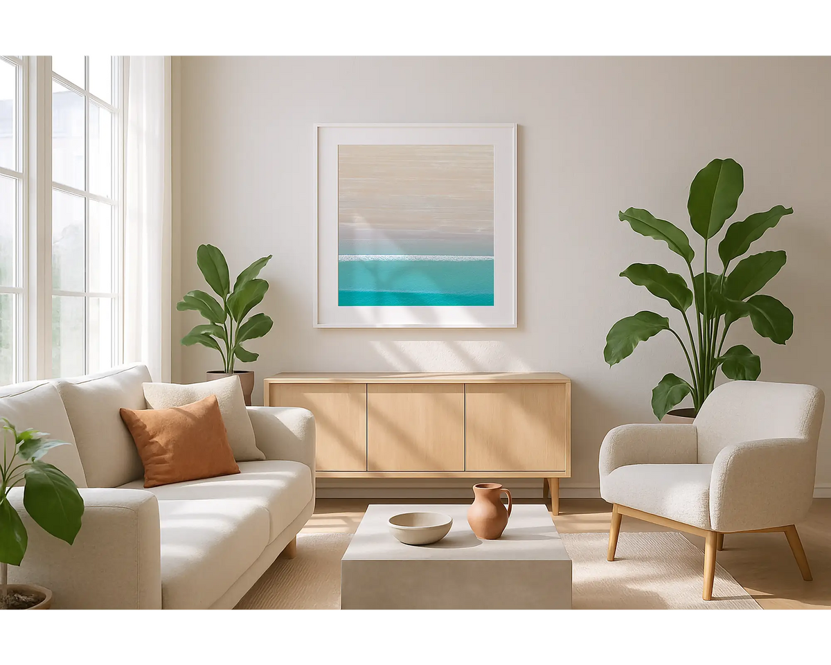 Cable Calm. Wall art print of Cable Beach, Broome, with a white frame, hung in a sunlit lounge room. 