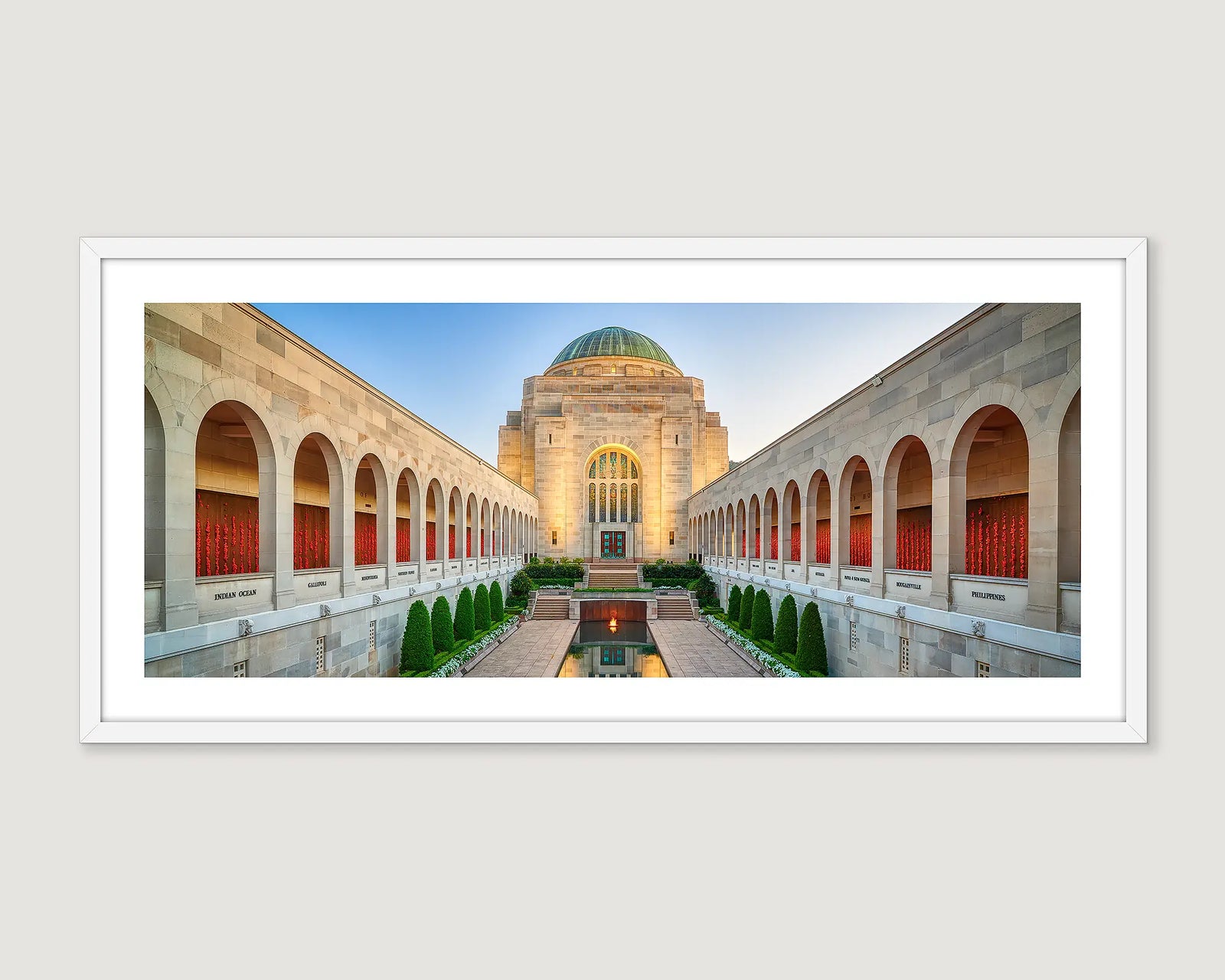 Stunning architectural scene of Australian War Memorial, framed in white.