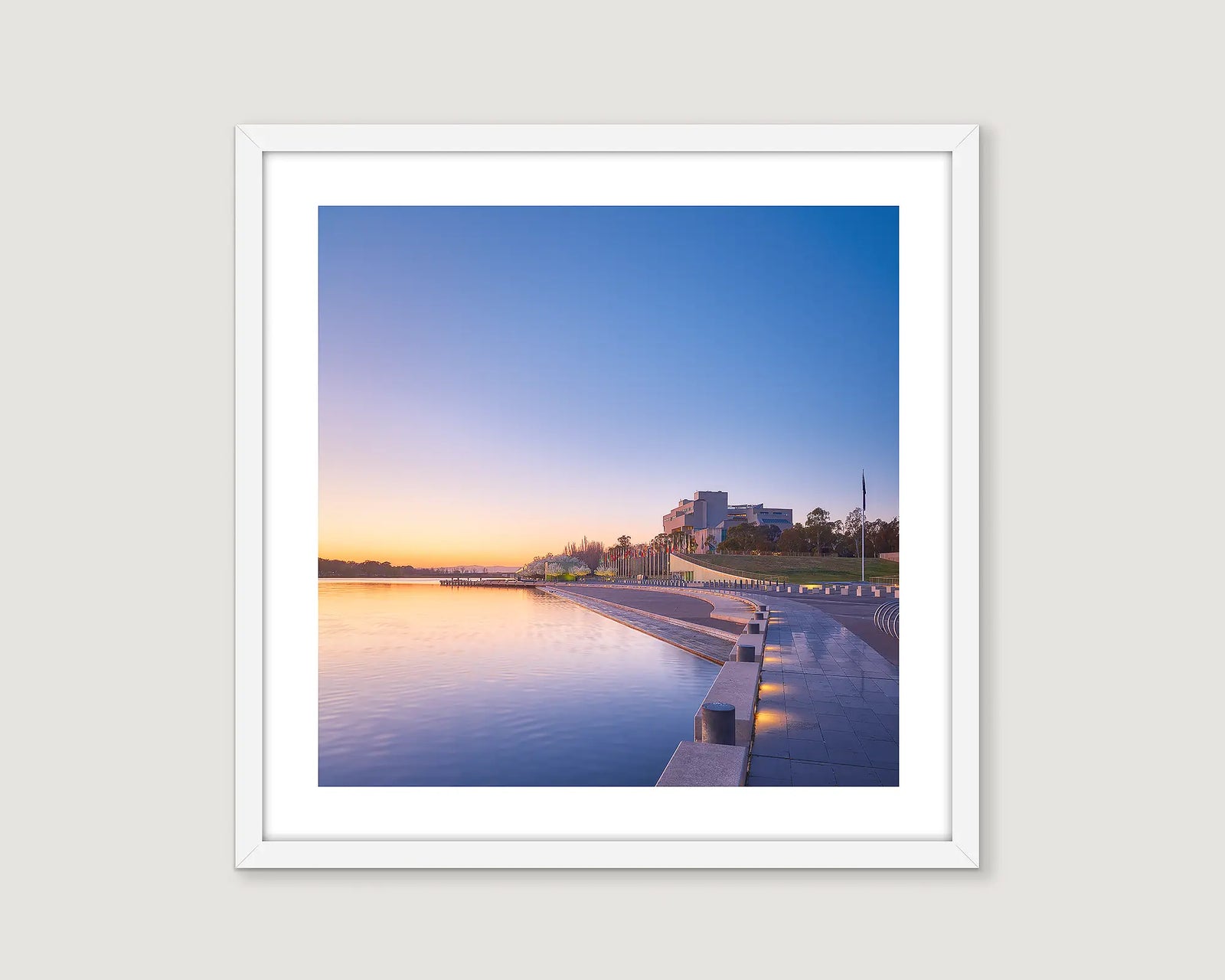 Framed wall art print of Lake Burley Griffin and the High Court early on a spring morning. 