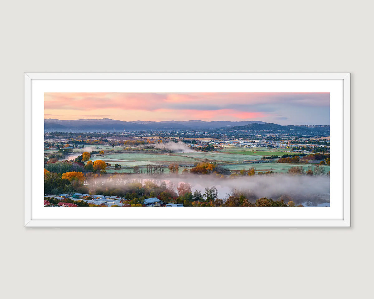 Framed photograph of a foggy sunrise along the Molonglo River and frost on the Canturf farm paddocks in Fyshwick.
