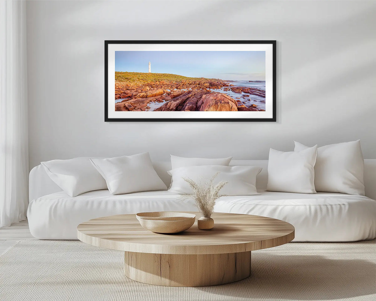 Cape Leeuwin Lighthouse. Black framed wall art print of Flinders Ranges, hung in a scandi-themed lounge room
