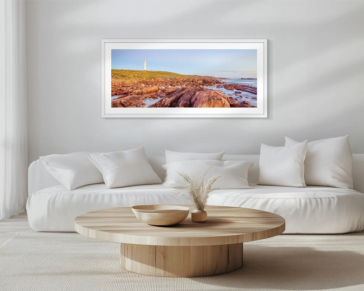 Cape Leeuwin Lighthouse. White framed wall art print of Flinders Ranges, hung in a scandi-themed lounge room. 